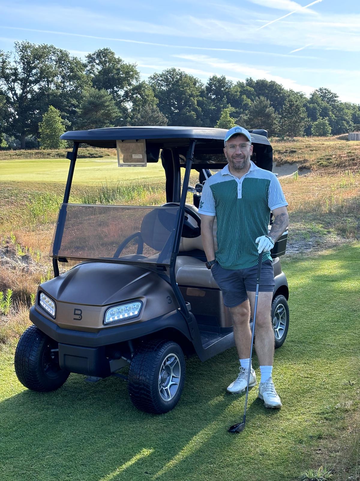 Ben on the course with his driver