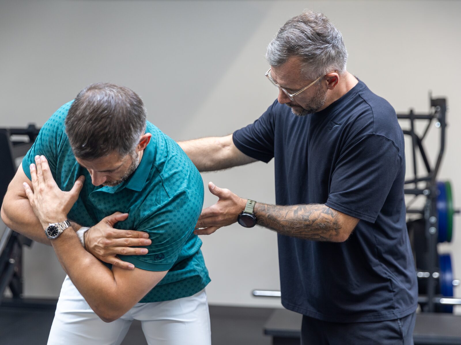 Ben assessing a client's trunk rotation during a movement screen