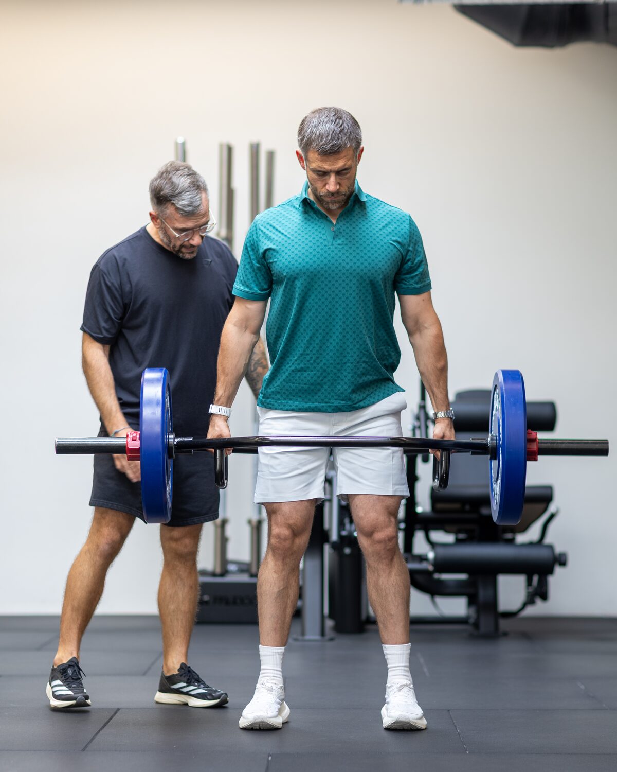 Ben coaching a client through a deadlift